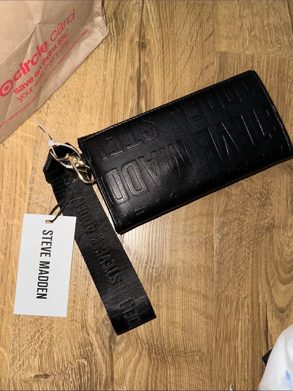 Steve Madden embossed logo print wristlet wallet